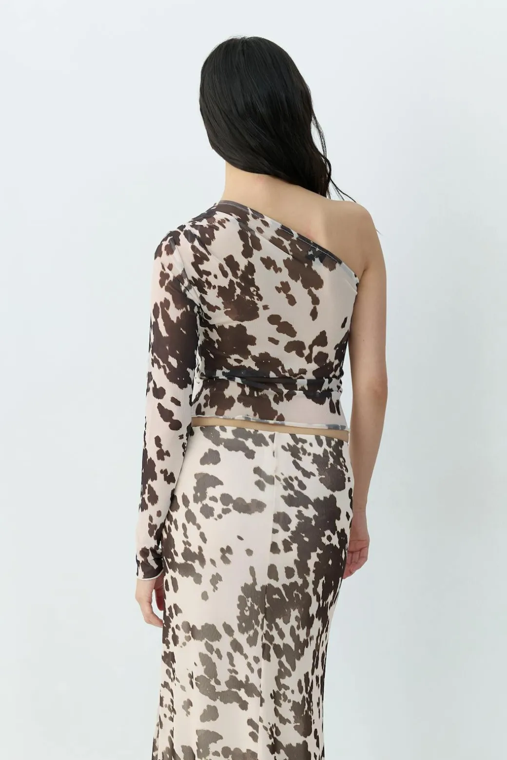 Asymmetric mesh top