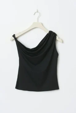 Asymmetric micro top