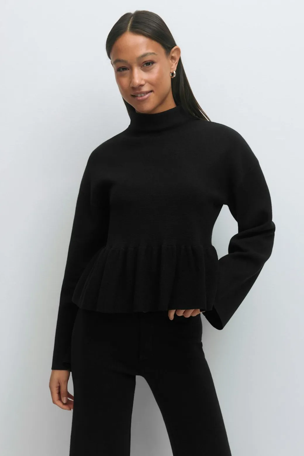 Knitted peplum top