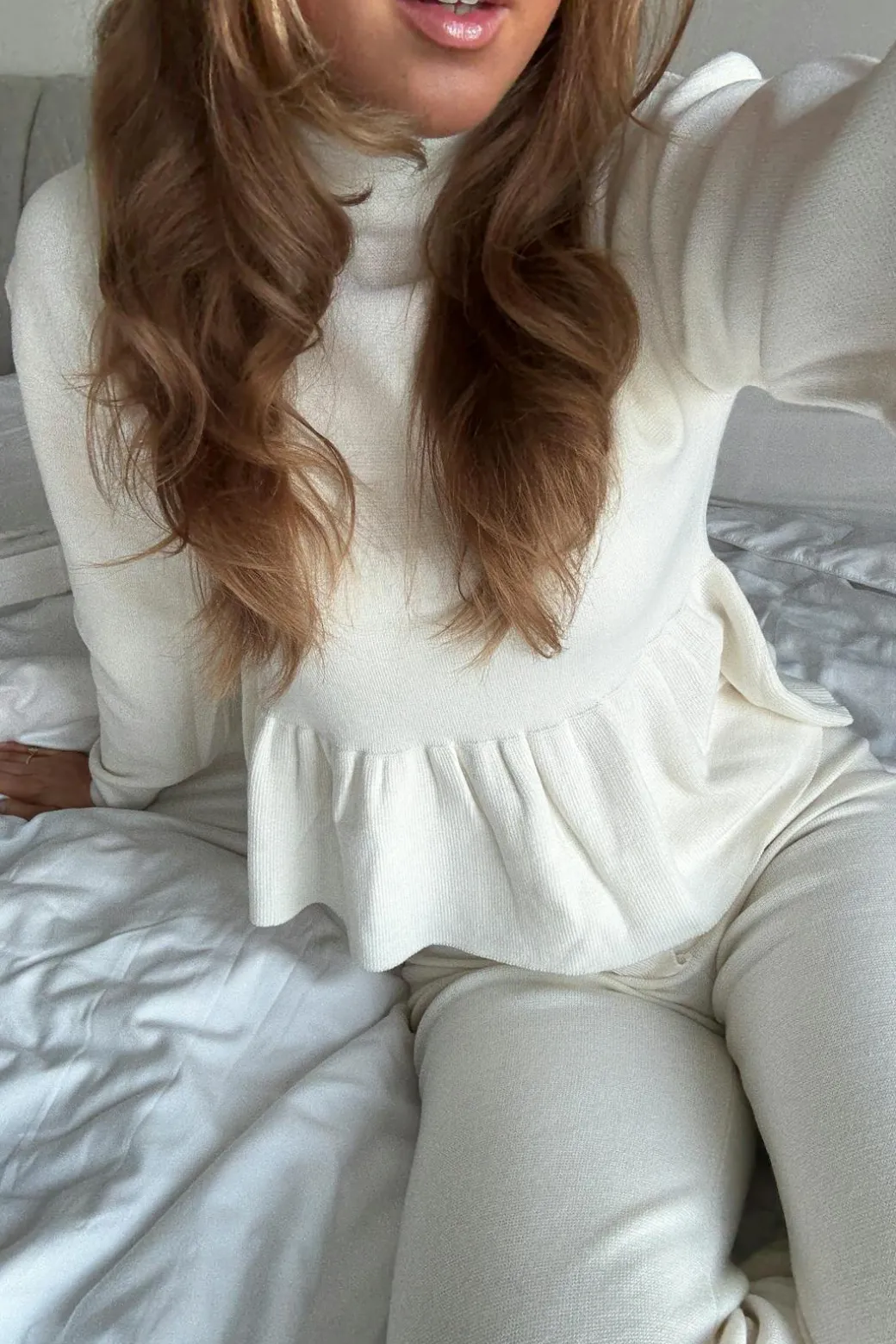 Knitted peplum top