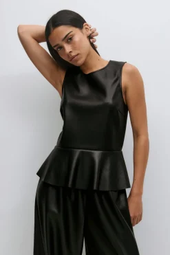Pu peplum top