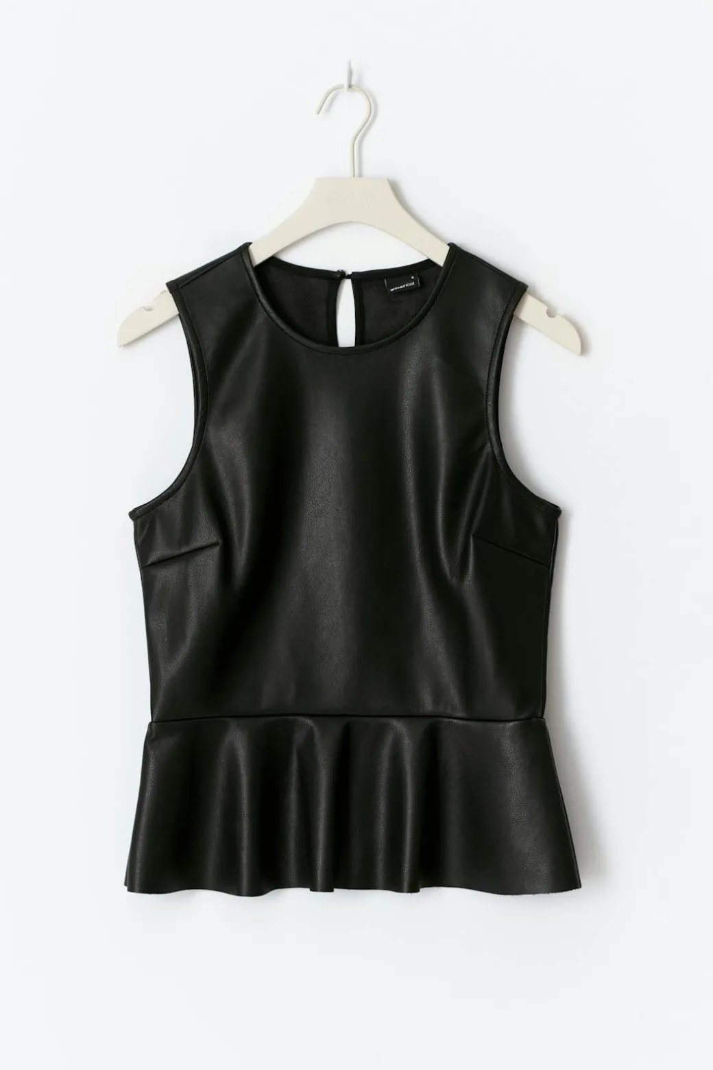 Pu peplum top
