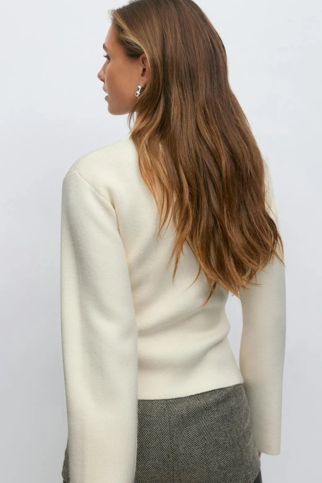 Shaped knitted cardigan