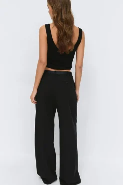 Wide pleated trousers